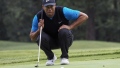 Photo: Woods turns down event, backs Mickelson